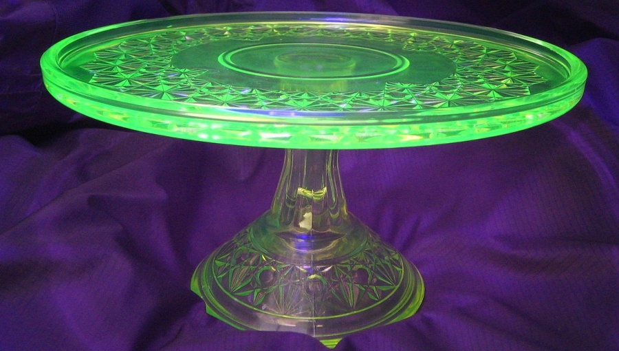 Uranium Glass fluorescing under ultraviolet light.