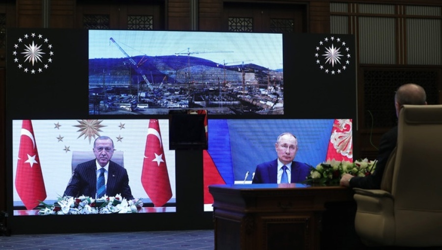 Vladimir Putin and Recep Tayyip Erdogan participating in a video link during a March 2021 foundation-laying ceremony.