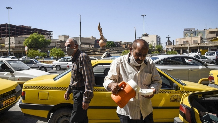 Taxi drivers in Ahvaz braving the heat.