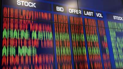 Asian stocks slide as oil prices surge past $100 per barrel