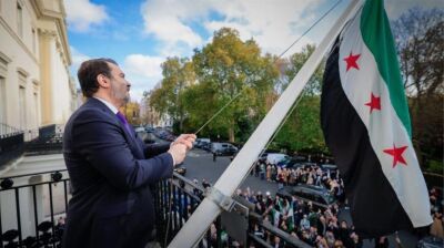 Syrian foreign minister kicks off London visit with flag-raising at reopened embassy