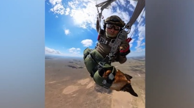Stressed dog or happy dog? Social media divided by parachute jump of Kazakh special forces canine Arisha