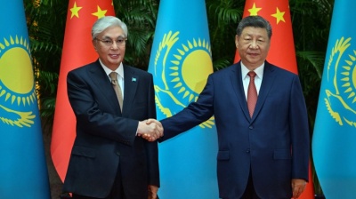 Tokayev, left, with Xi ahead of appearances the presidents were due to make at the World Artificial Intelligence Conference in Shanghai.