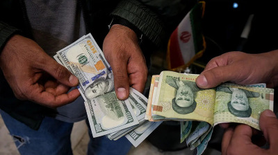 Subsidy rollback pushes Iran’s dollar rate to IRR 1.47mn