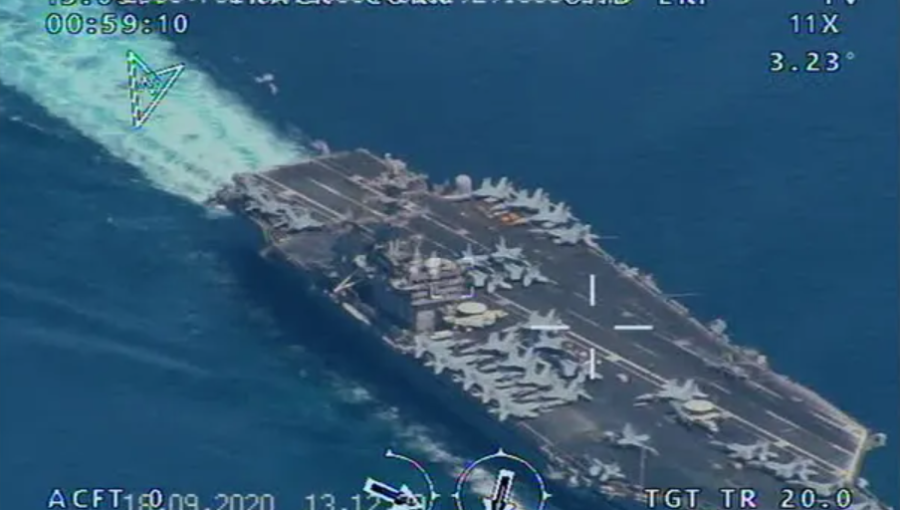 A handout picture released by the official website of the IRGC reportedly shows the USS Nimitz aircraft carrier as it prepares to enter the Strait of Hormuz.