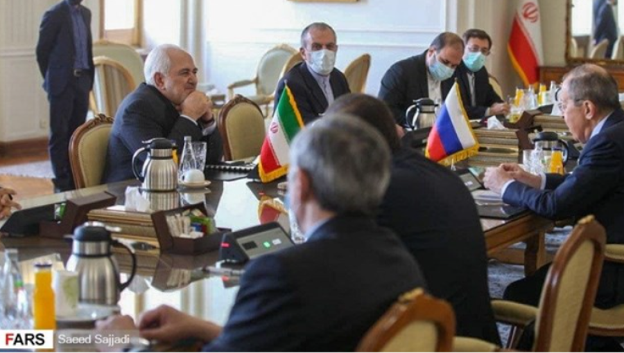 Iran's foreign minister Mohammad Javad Zarif (left) sitting across the table from Russian counterpart Sergei Lavrov who made an impromptu visit to Tehran on April 13.