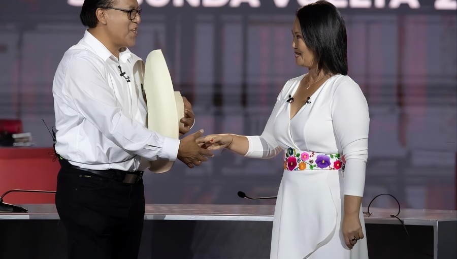 Peru election produces two verdicts with Fujimori ahead in official count but rapid polls favouring Sánchez